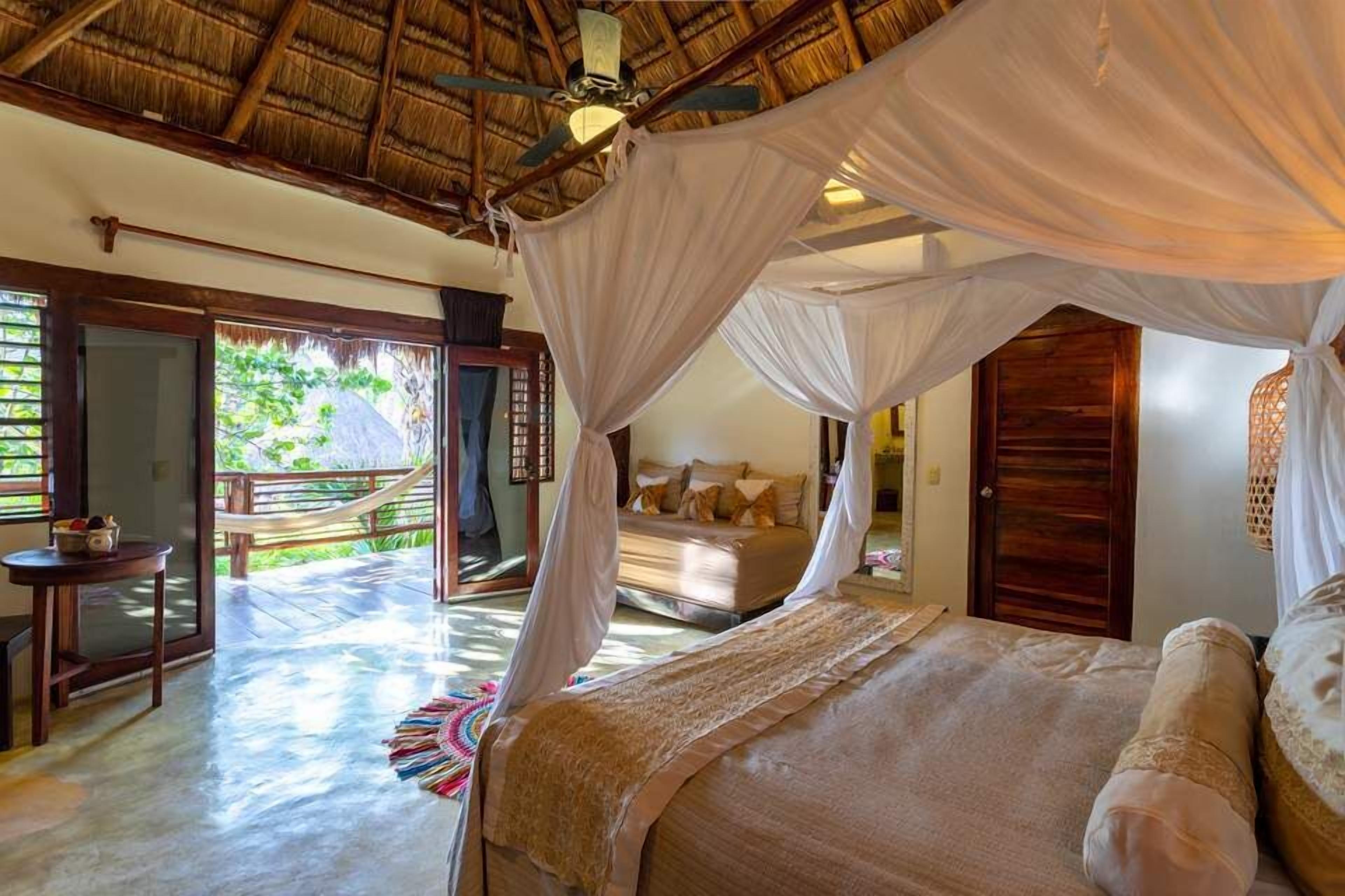 room, garden view | minibar, in-room safe, blackout curtains, iron/ironing board