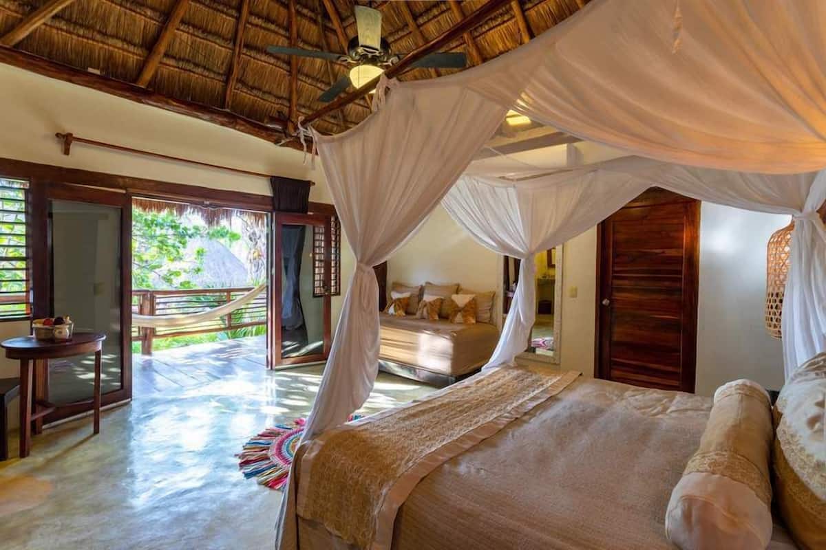 room, garden view | minibar, in-room safe, blackout curtains, iron/ironing board