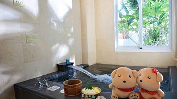 Villa Earl | Bathroom | Separate tub and shower, hair dryer, slippers, towels