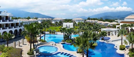 Outdoor pool, sun loungers, lifeguards on site