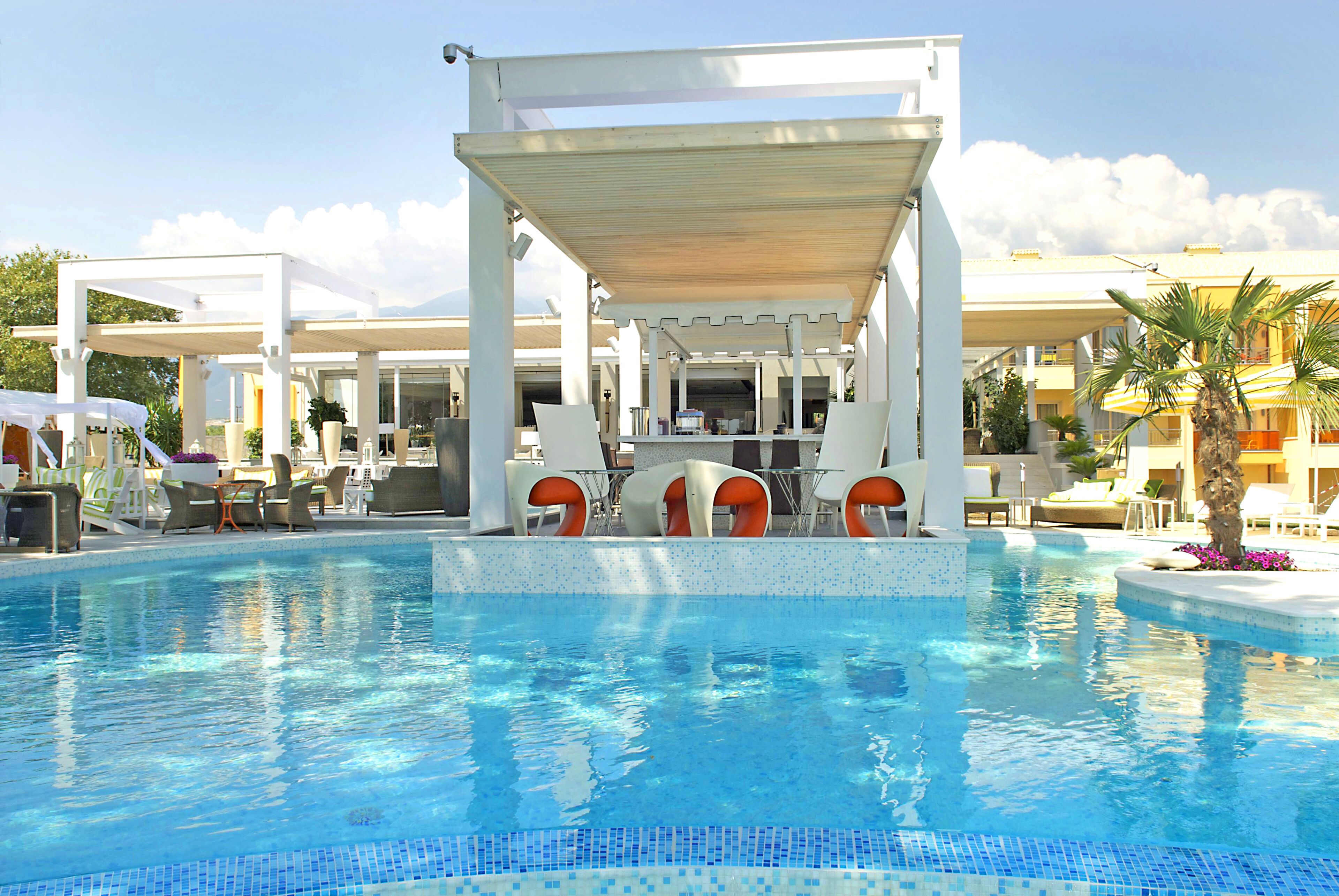 outdoor pool, open 11:00 am to 7:00 pm, pool umbrellas, pool loungers