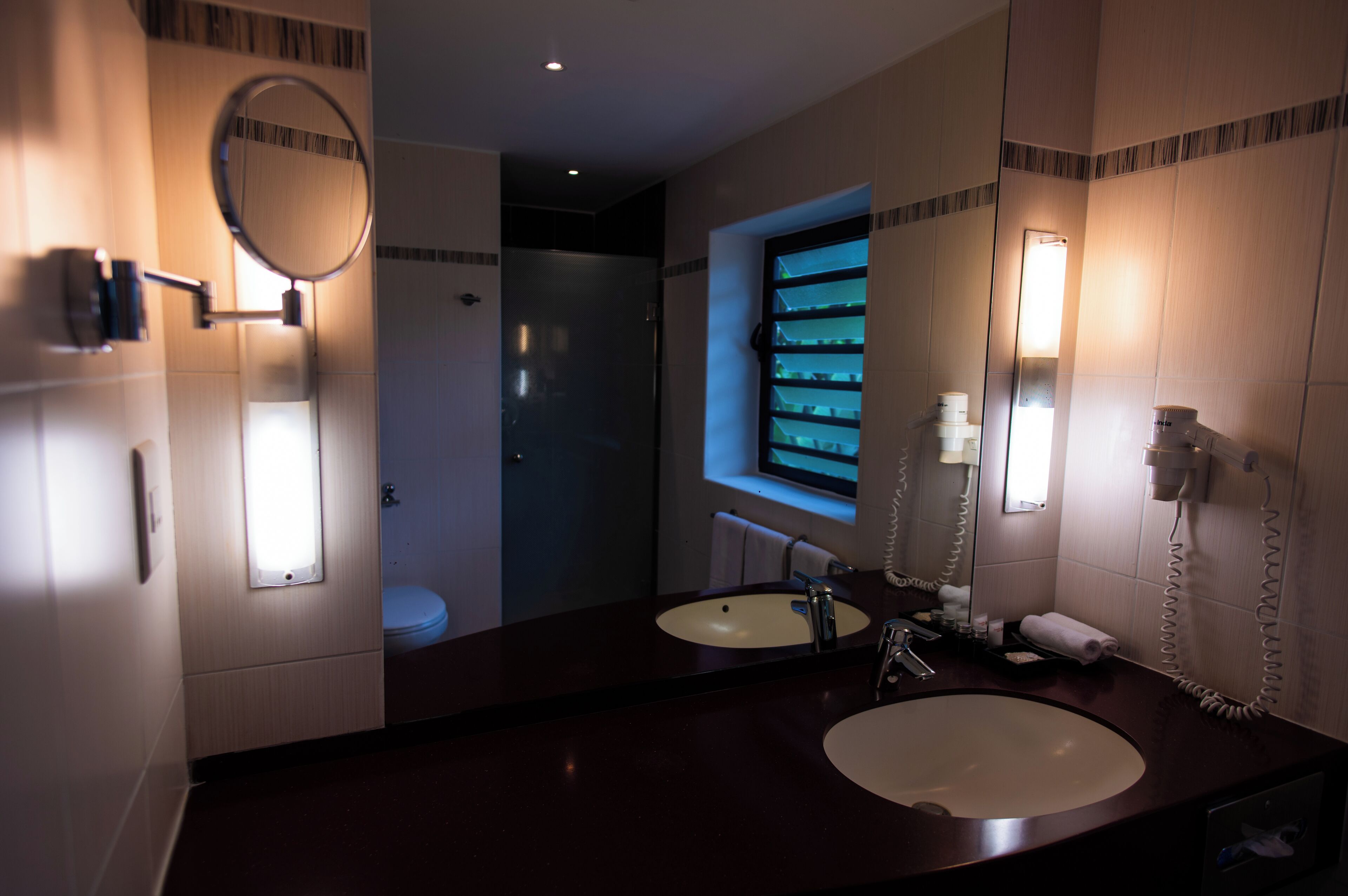 superior room with beach access and ocean view | bathroom | shower, eco-friendly toiletries, hair dryer, bathrobes