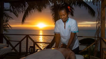 Guests can enjoy soothing spa treatments with a serene ocean view.