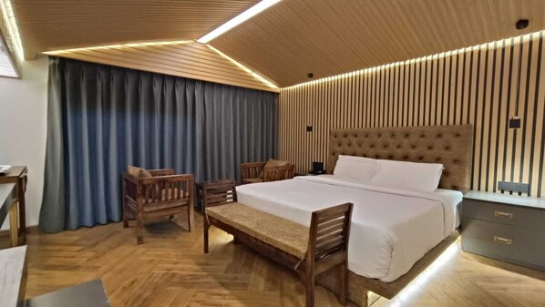 Habitación de lujo, 1 habitación | Escritorio, cortinas blackout, wifi gratis y ropa de cama 