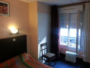 Blackout curtains, iron/ironing board, free WiFi, bed sheets