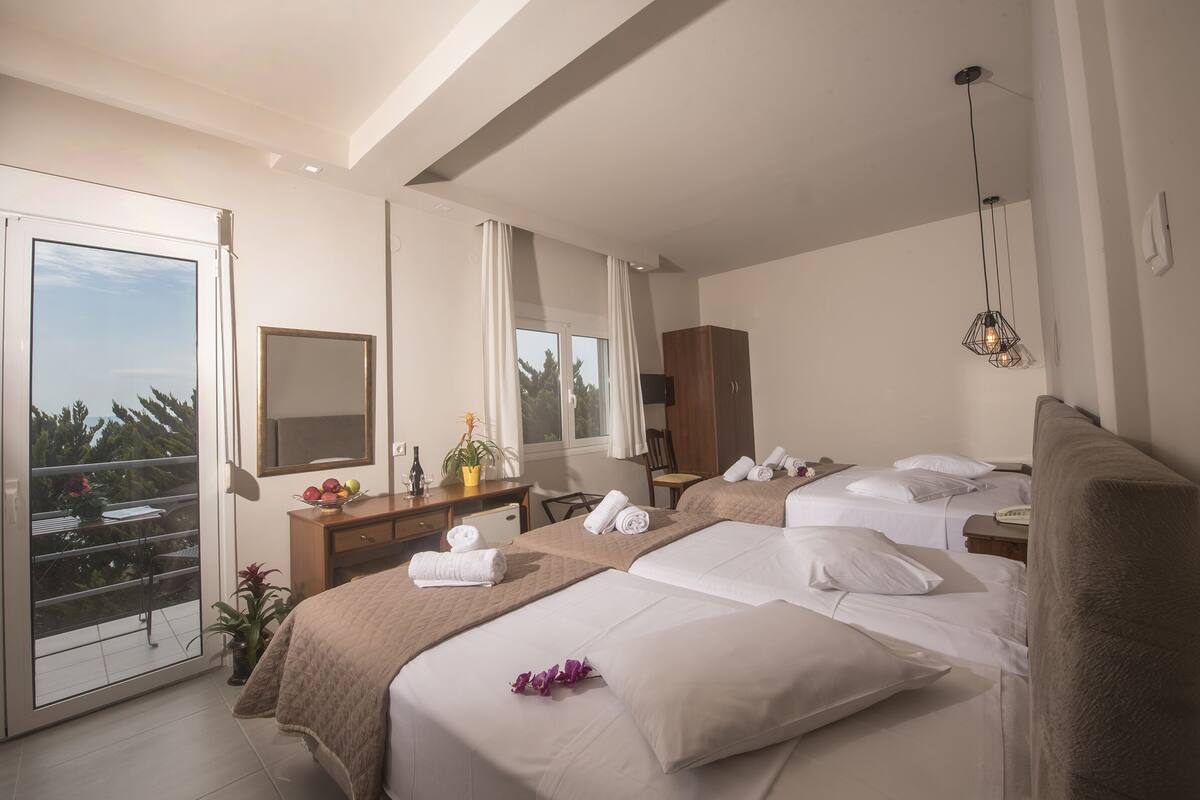 standard quadruple room | in-room safe, desk, blackout curtains, soundproofing