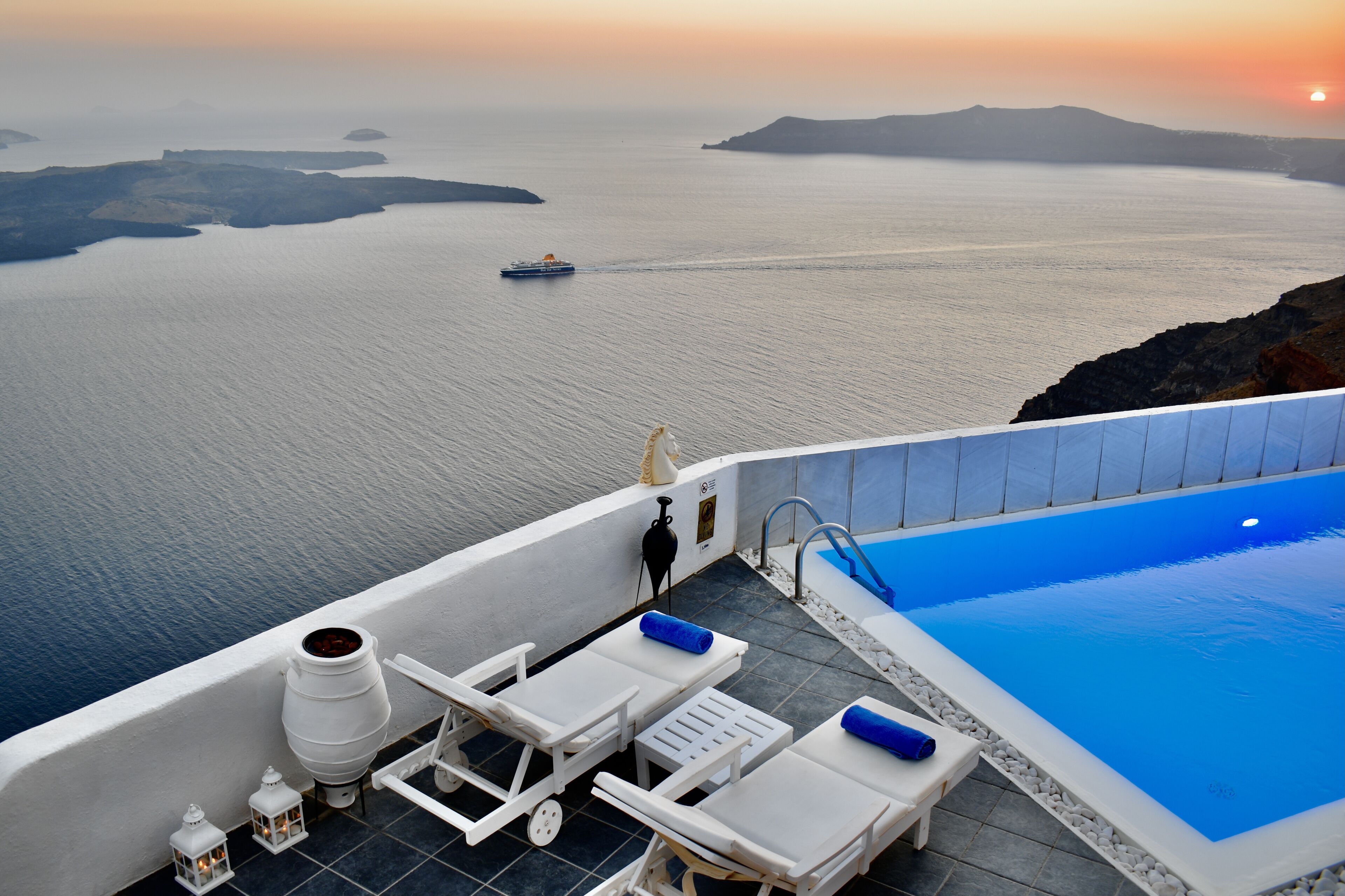 Outdoor pool, open 9:00 AM to 9:00 PM, pool umbrellas, pool loungers
