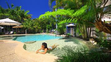 Outdoor pool, pool umbrellas, sun loungers