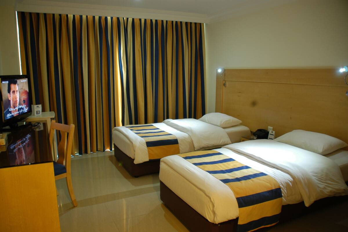 Standard Triple Room | 加厚床垫、免费迷你吧物品、客房内保险箱、办公桌