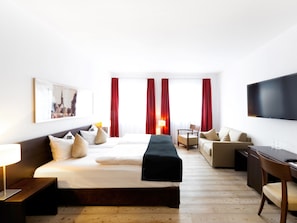 Habitación Deluxe | Artículos del minibar gratis y caja de seguridad en la habitación