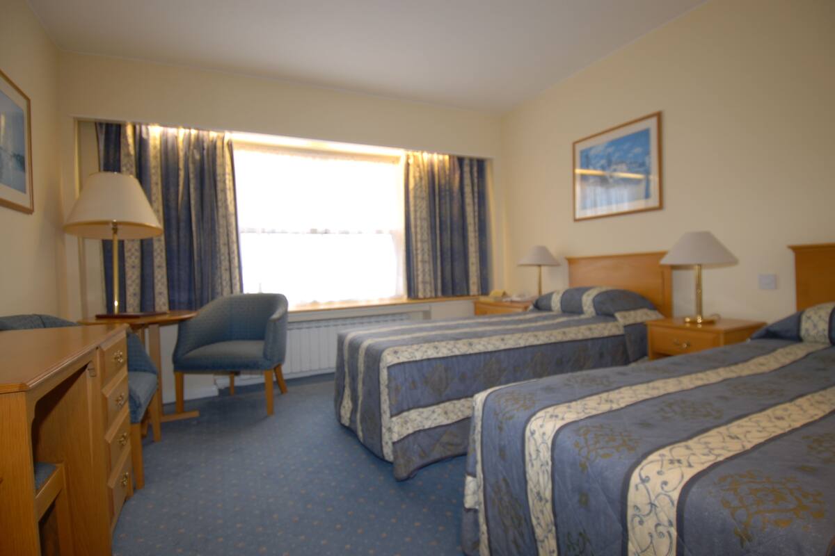 Twin Room | Pillow-top beds, in-room safe, iron/ironing board, free WiFi