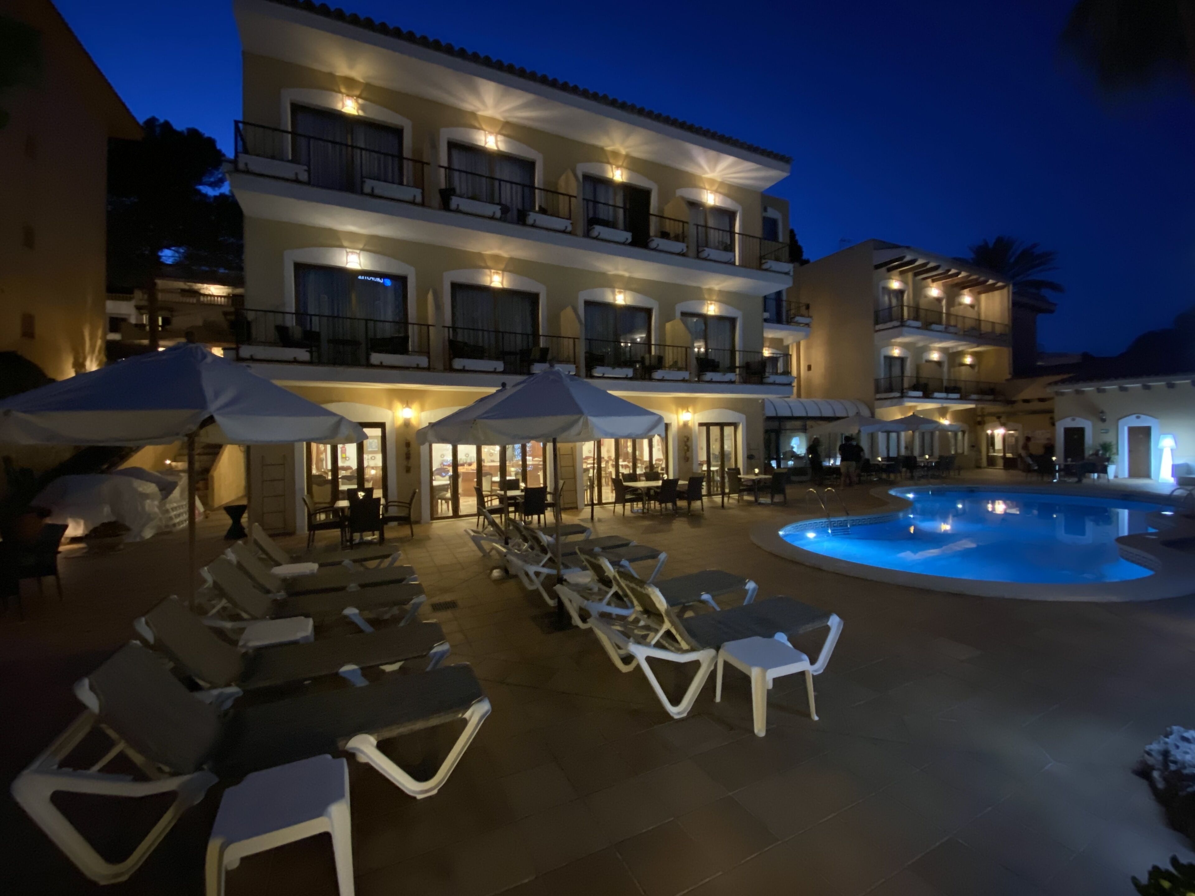 Outdoor pool, open 8:00 AM to 9:00 PM, pool umbrellas, pool loungers