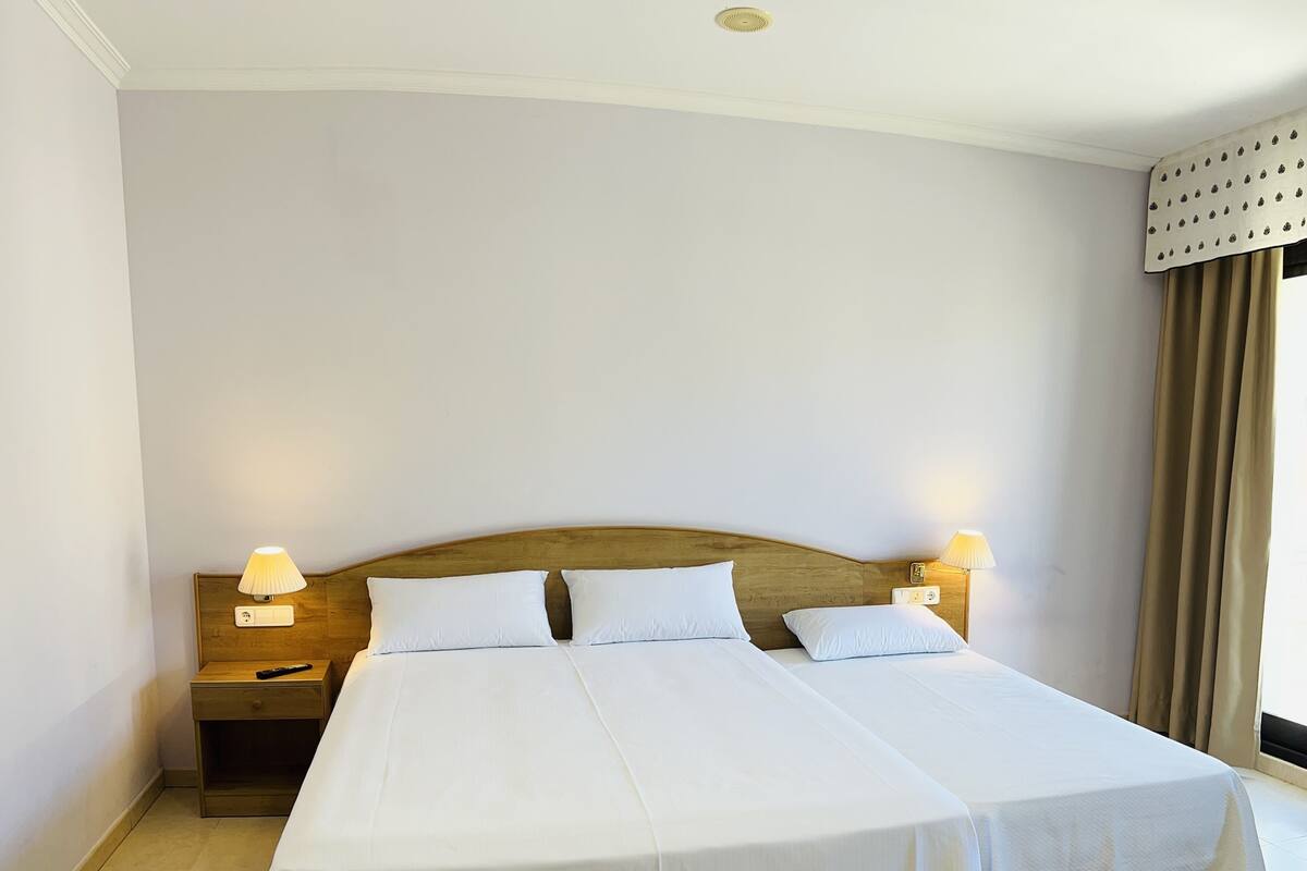 Desk, free WiFi, bed sheets