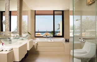 Eco-friendly toiletries, hair dryer, bathrobes, slippers
