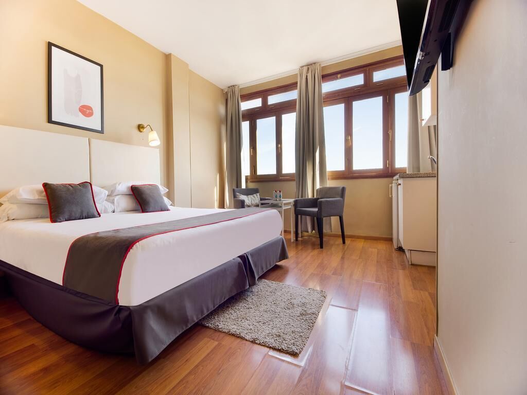 Een laptopwerkplek, gratis wifi, beddengoed