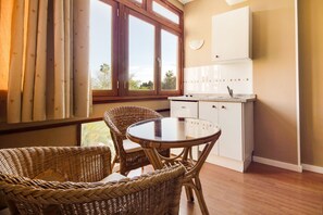 Mini-fridge, stovetop, coffee/tea maker, electric kettle