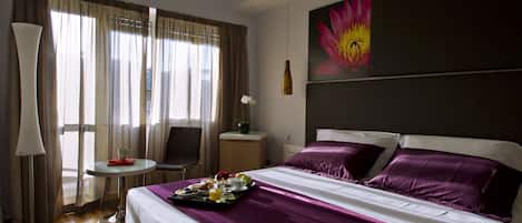 Seprai premium, minibar, dan brankas