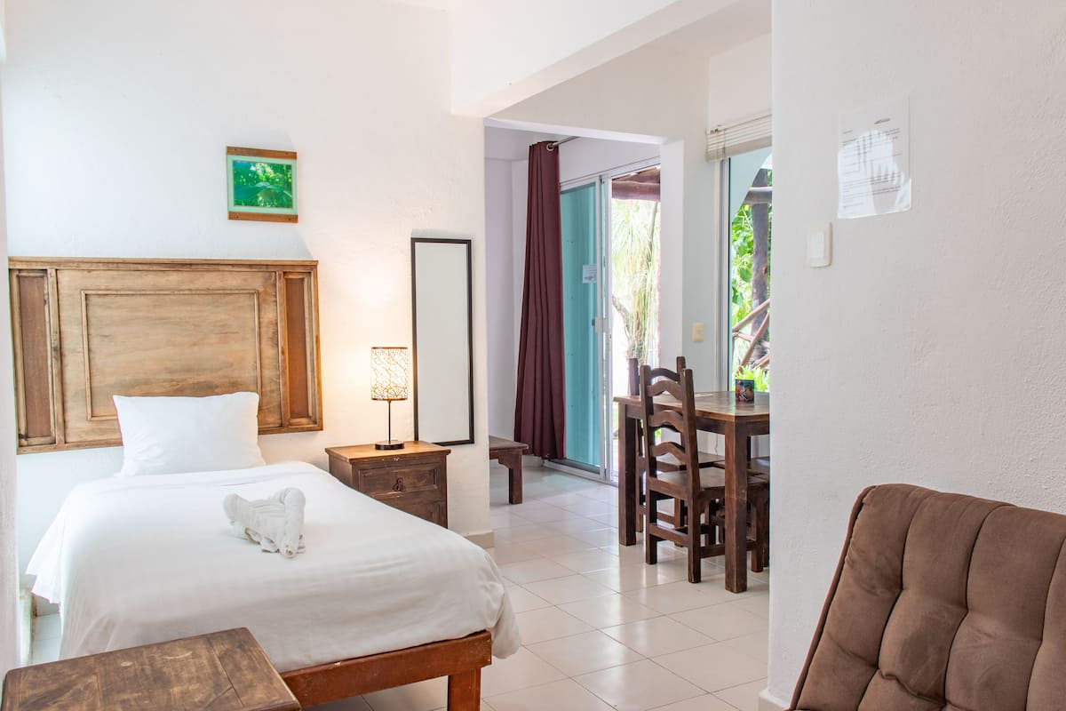 Studio for Four | 1 bedroom, premium bedding, down comforters, in-room safe