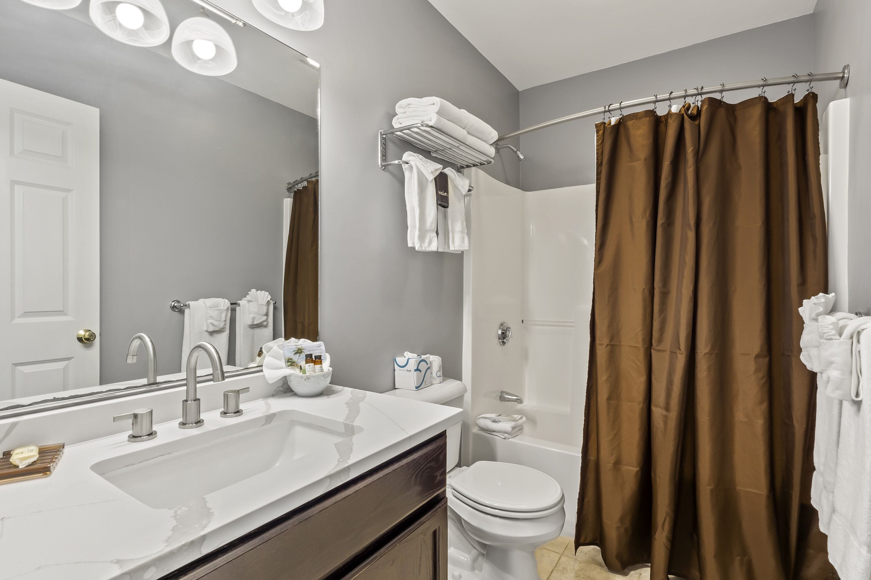 suite (suite 1 king bed-steps to access room) | bathroom | free toiletries, hair dryer, towels, soap