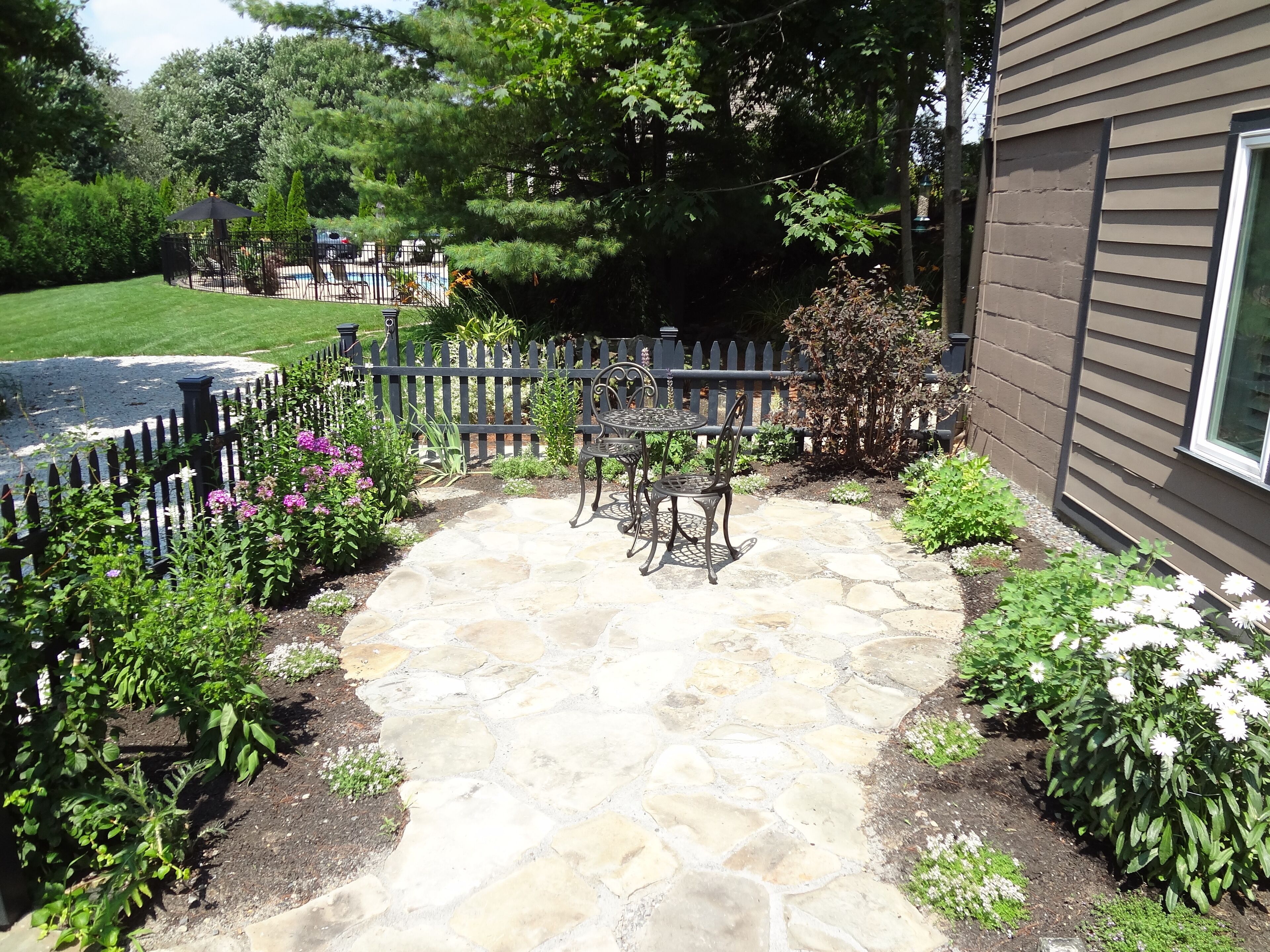 studio suite, 1 king bed, kitchen (stairs required) | garden view