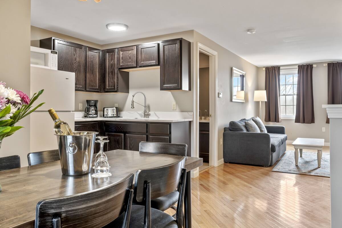 townhouse suite, 2 queen beds and sofa bed (stairs required) | private kitchen | fridge, microwave, coffee/tea maker, toaster