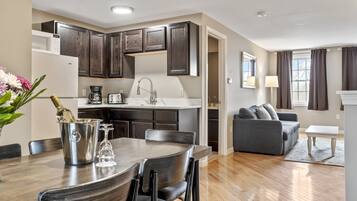 Townhouse Suite, 2 Queen Beds and Sofa Bed (Stairs Required) | Private kitchen | Fridge, microwave, coffee/tea maker, toaster
