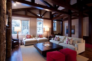 Apartment, 5 Bedrooms (Slopeside Residence E6) | Living area | 50-inch flat-screen TV with cable channels, TV, fireplace