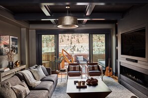 50-inch flat-screen TV with cable channels, TV, fireplace