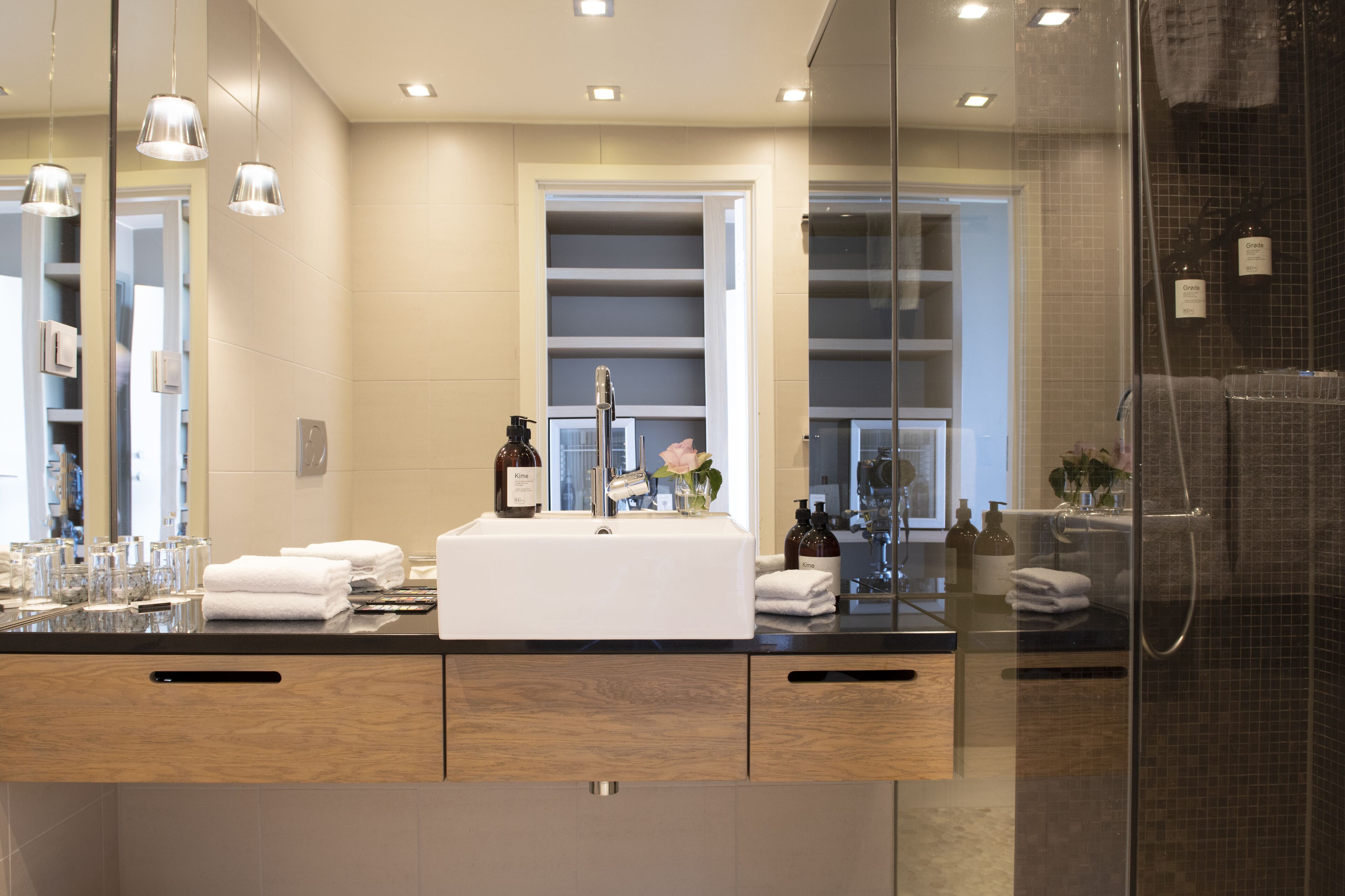 superior room | bathroom | shower, rainfall showerhead, designer toiletries, towels