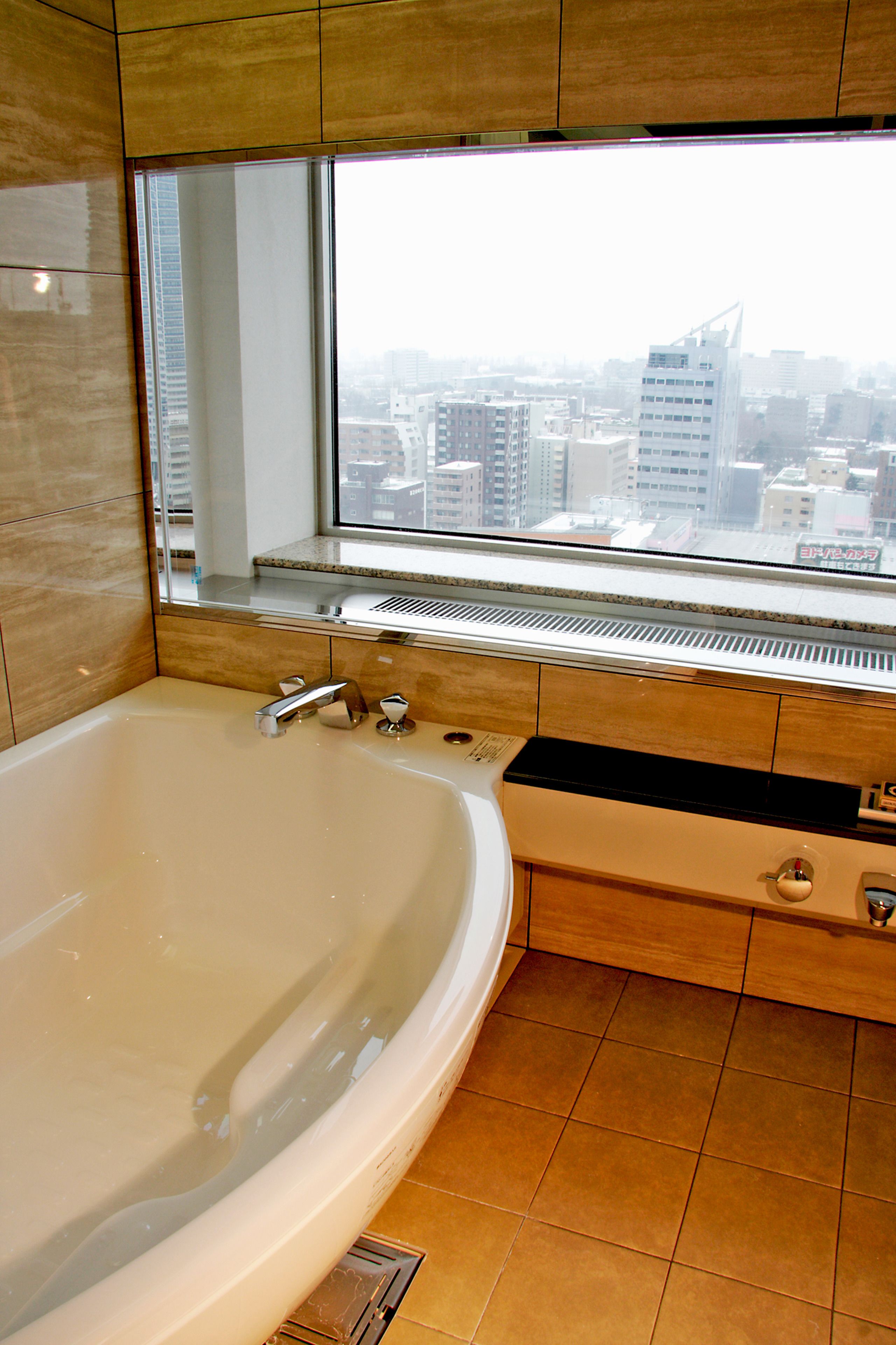 exclusive twin room, non smoking | bathroom | combined shower/bathtub, deep-soaking bathtub, free toiletries