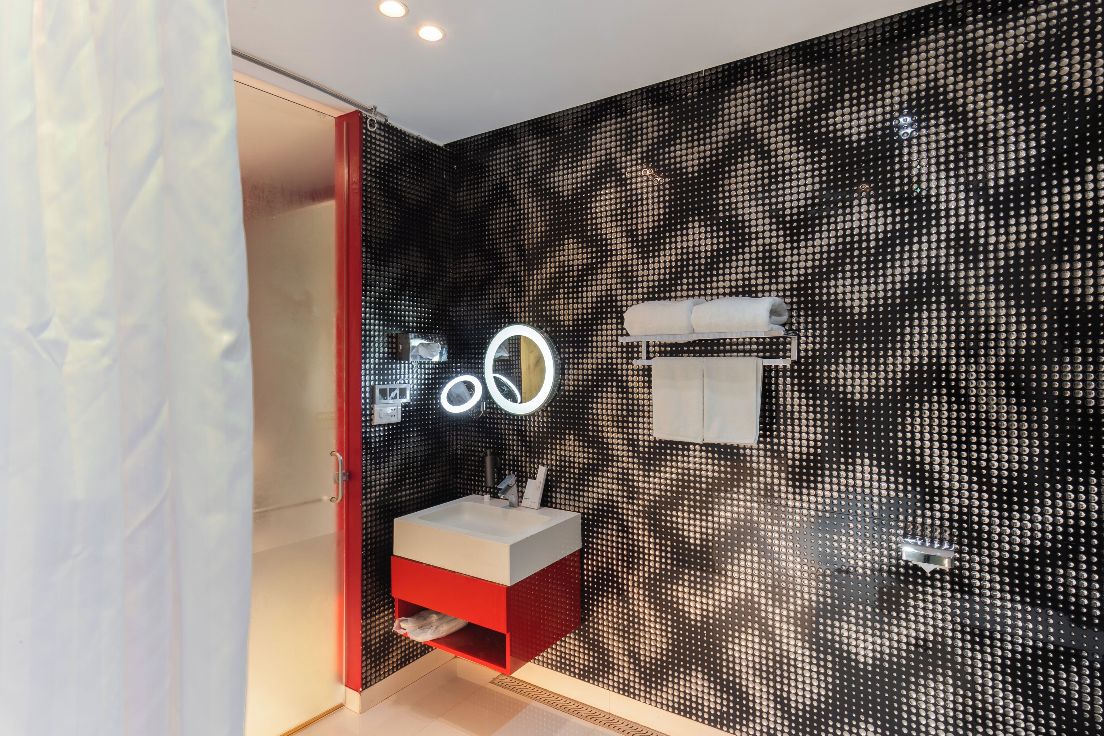 panoramic suite | bathroom | rainfall showerhead, hair dryer, towels