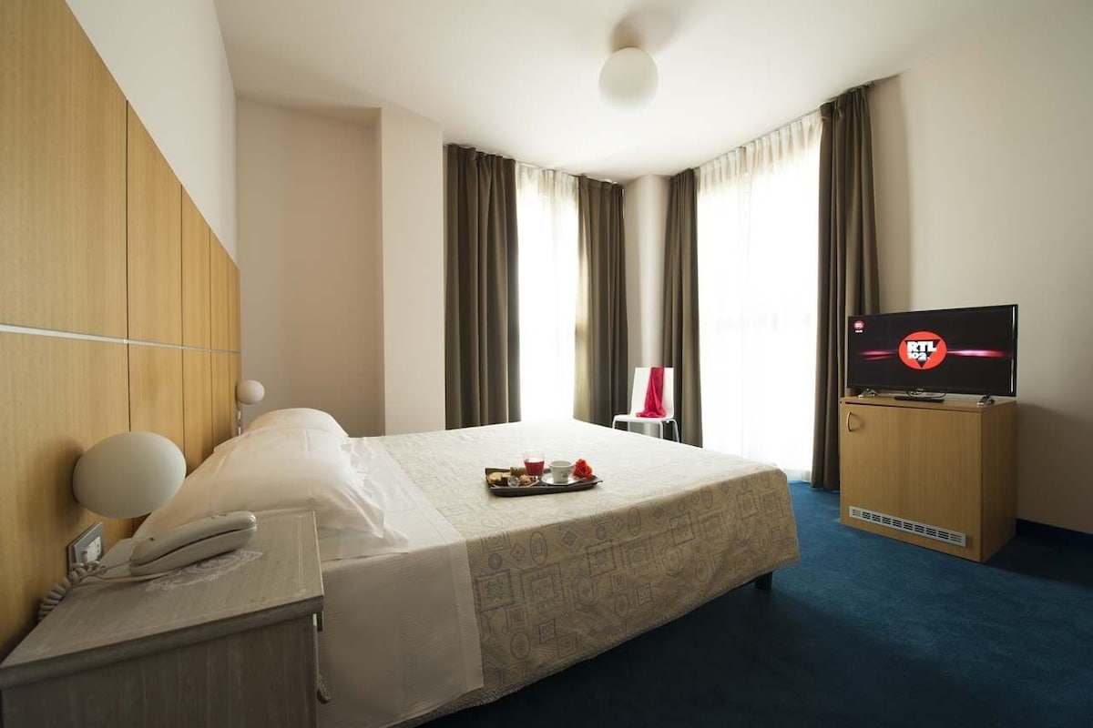 Sábanas italianas Frette, edredón y minibar
