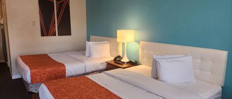 Blackout curtains, iron/ironing board, rollaway beds, free WiFi