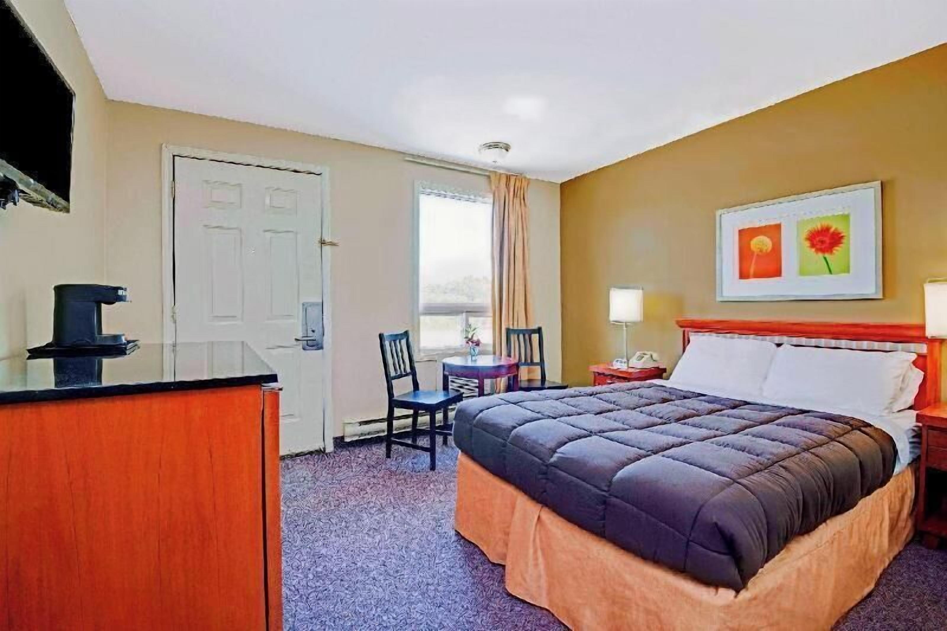 Blackout curtains, iron/ironing board, rollaway beds, free WiFi