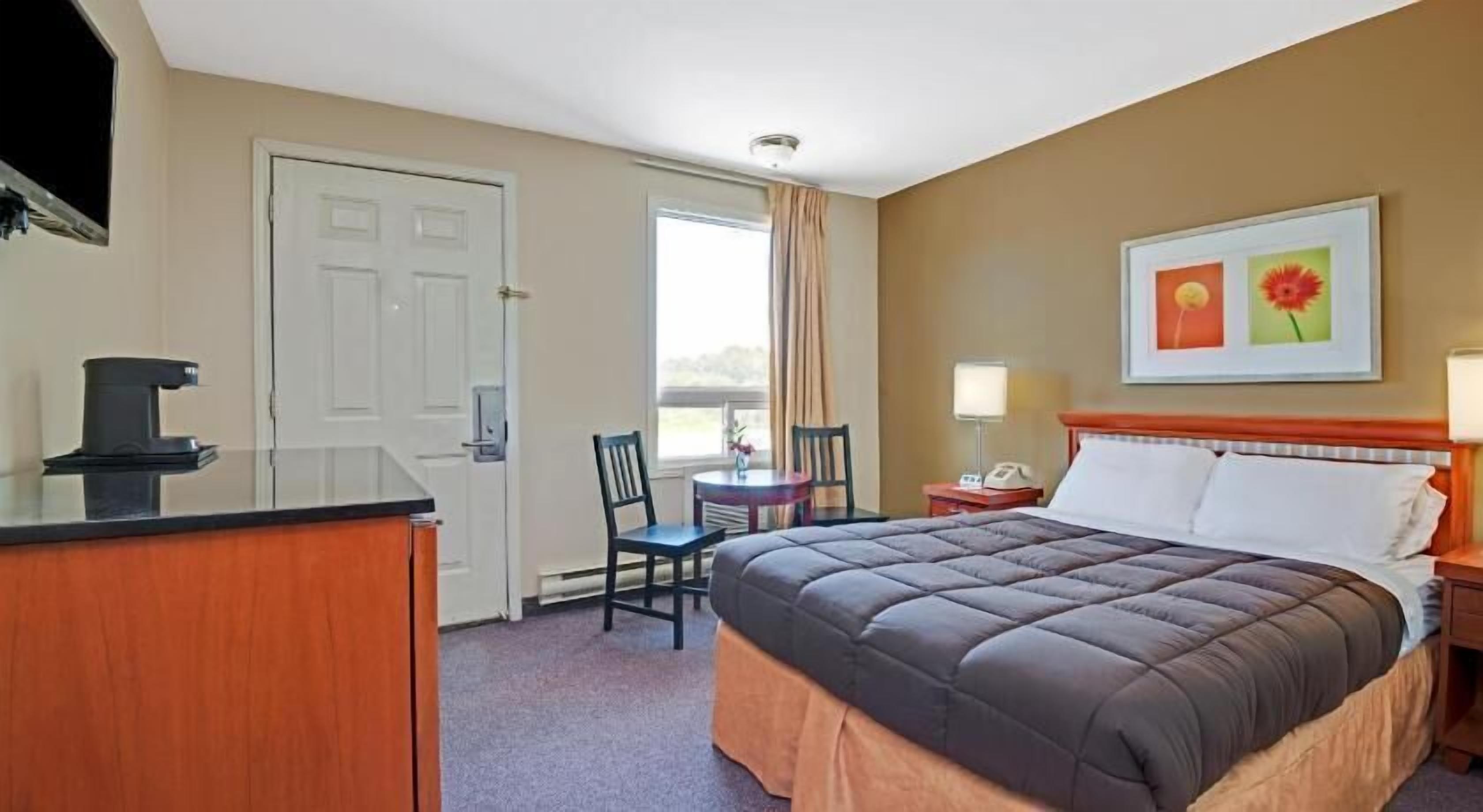 Blackout curtains, iron/ironing board, rollaway beds, free WiFi