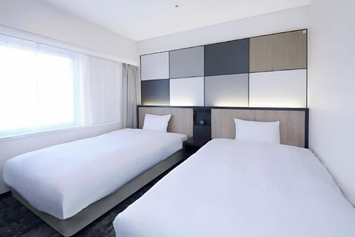 Down comforters, desk, blackout drapes, free WiFi