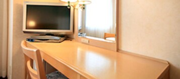 Desk, free WiFi, bed sheets