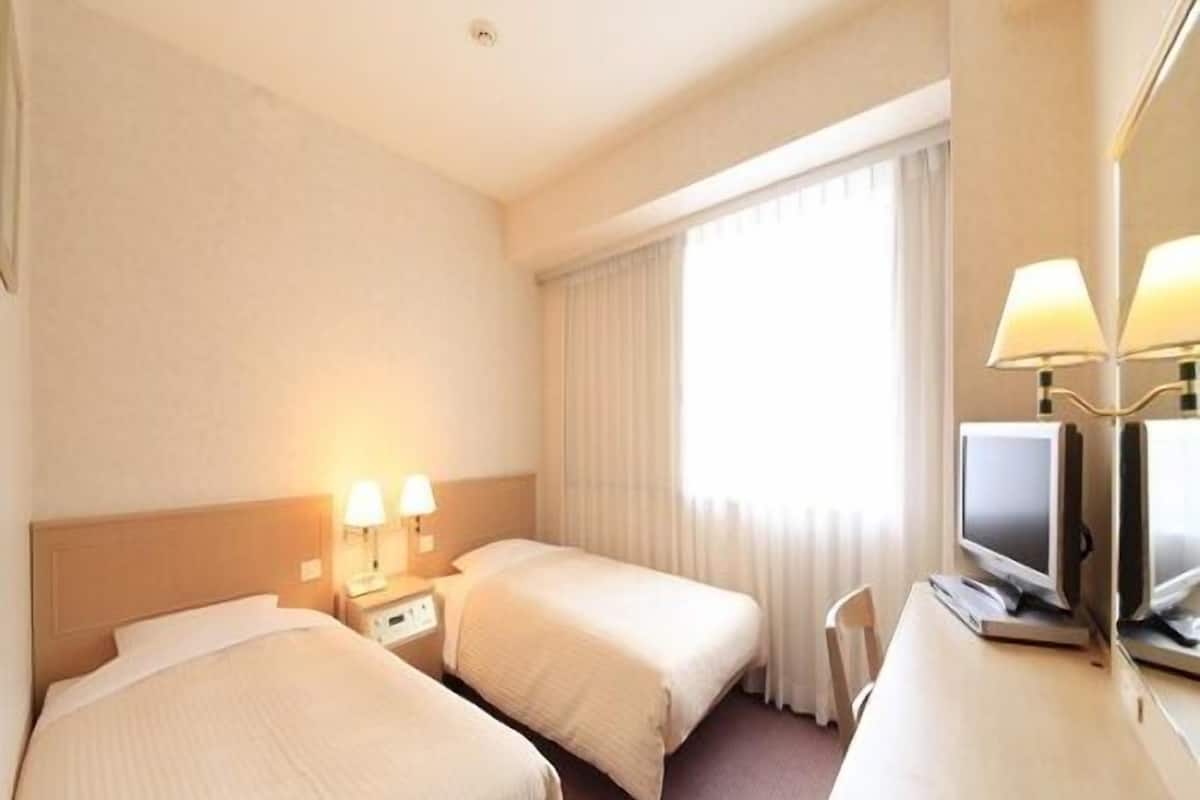 Desk, WiFi (free), bed sheets