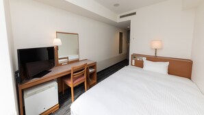 A hotel room with a bed, a desk with a computer, a television, and a lamp. - Nara Washington Hotel Plaza (Nara)