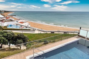 On the beach, beach umbrellas, beach towels