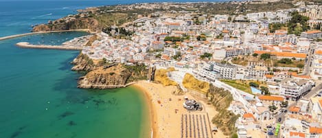 On the beach, beach umbrellas, beach towels