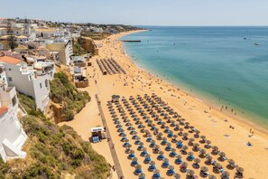 On the beach, beach umbrellas, beach towels