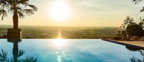 Outdoor pool, pool umbrellas, pool loungers