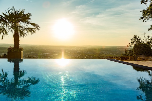Outdoor pool, open 7:00 AM to 8:00 PM, pool umbrellas, pool loungers