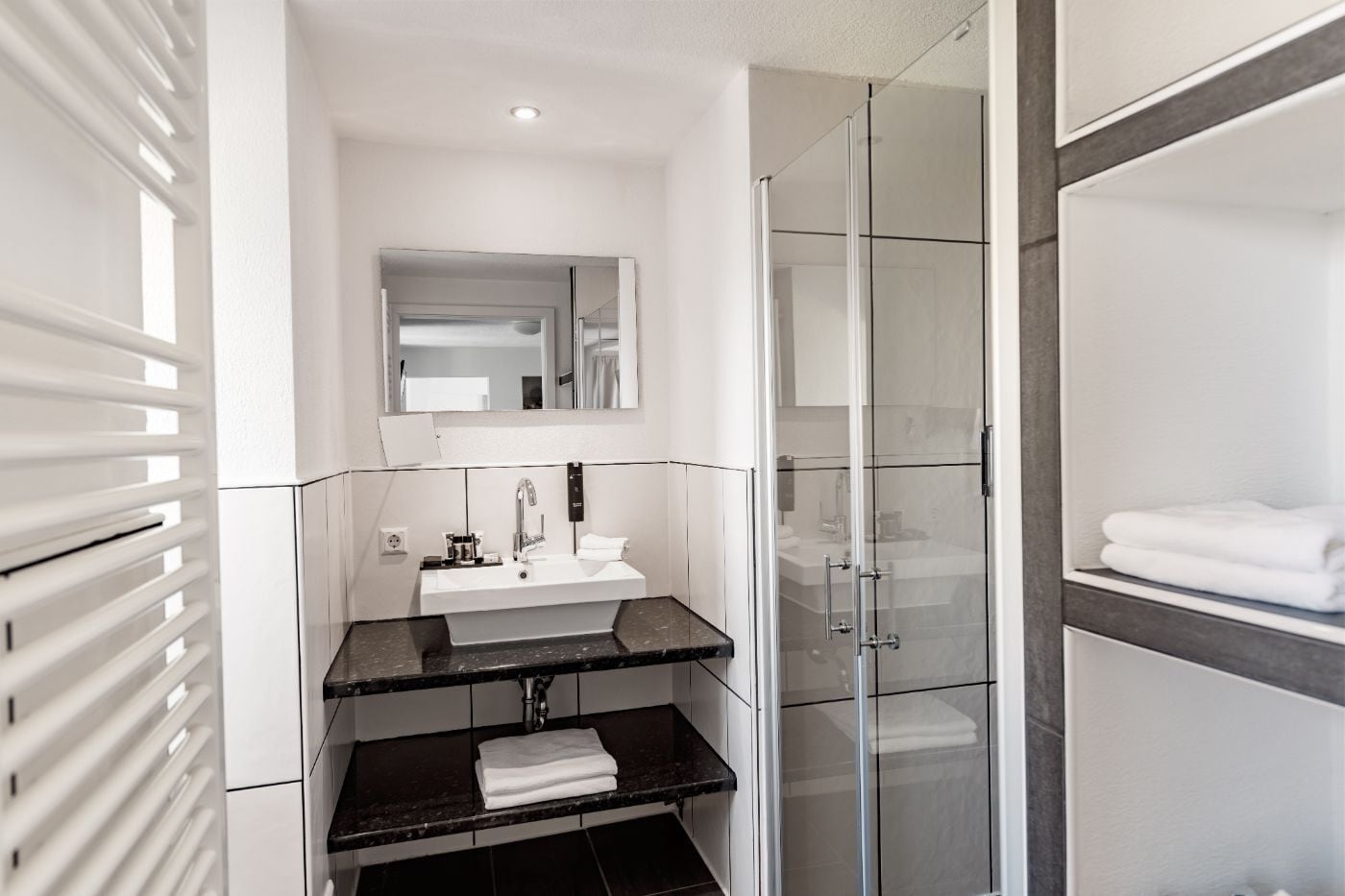 comfort apartment | bathroom | rainfall showerhead, hair dryer, bathrobes, slippers