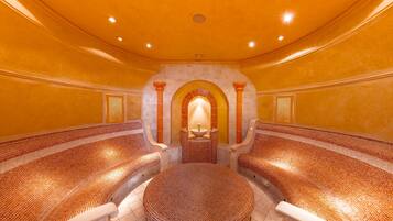 Relax in a serene space with a central seating area surrounded by comfortable chairs.