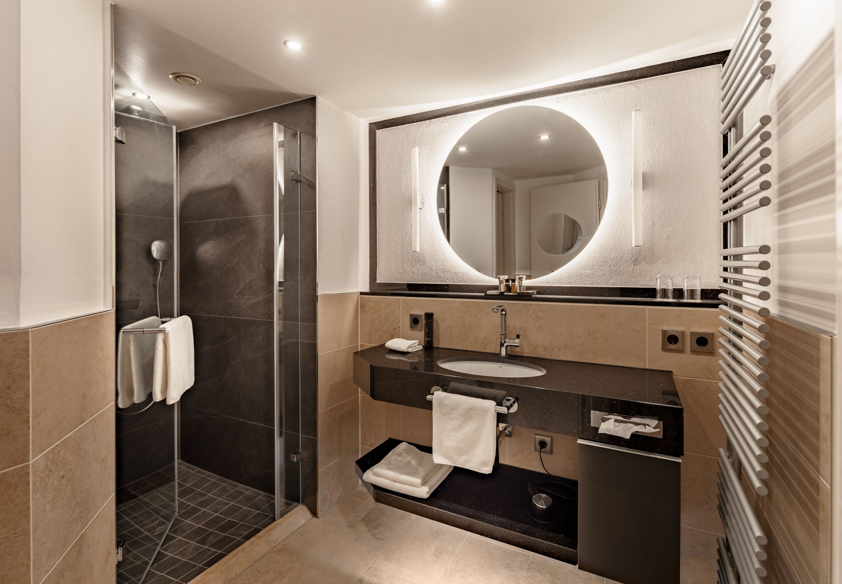 rainfall showerhead, hair dryer, bathrobes, slippers