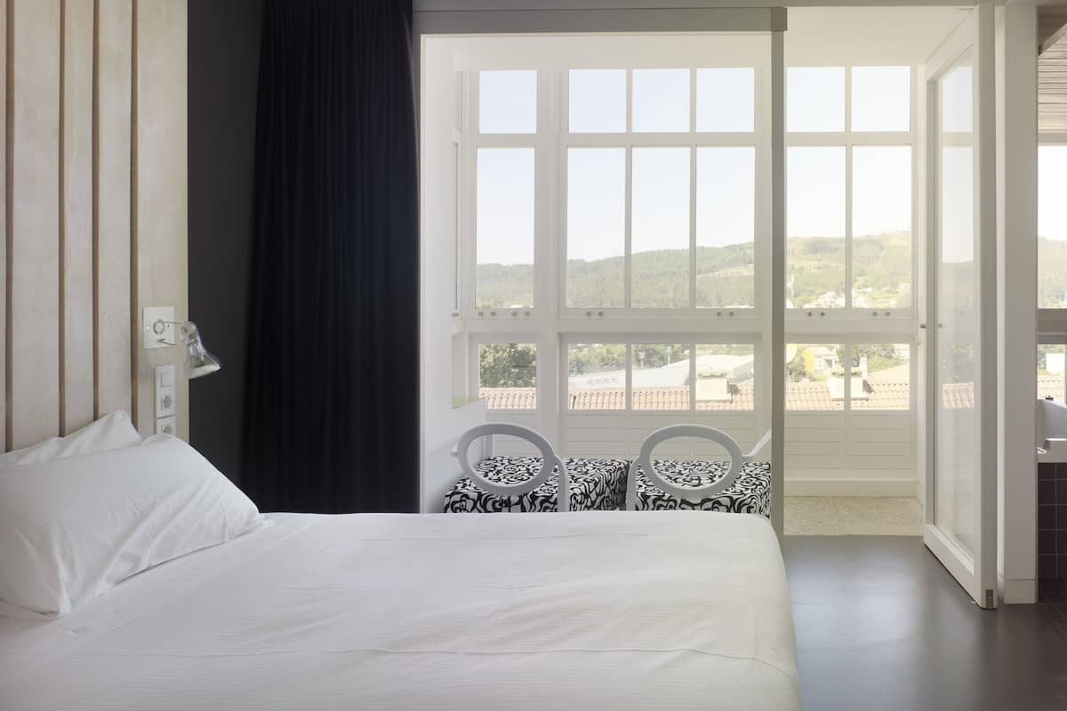 superior double room (gallery and panoramic bath) | 1 bedroom, premium bedding, select comfort beds, minibar