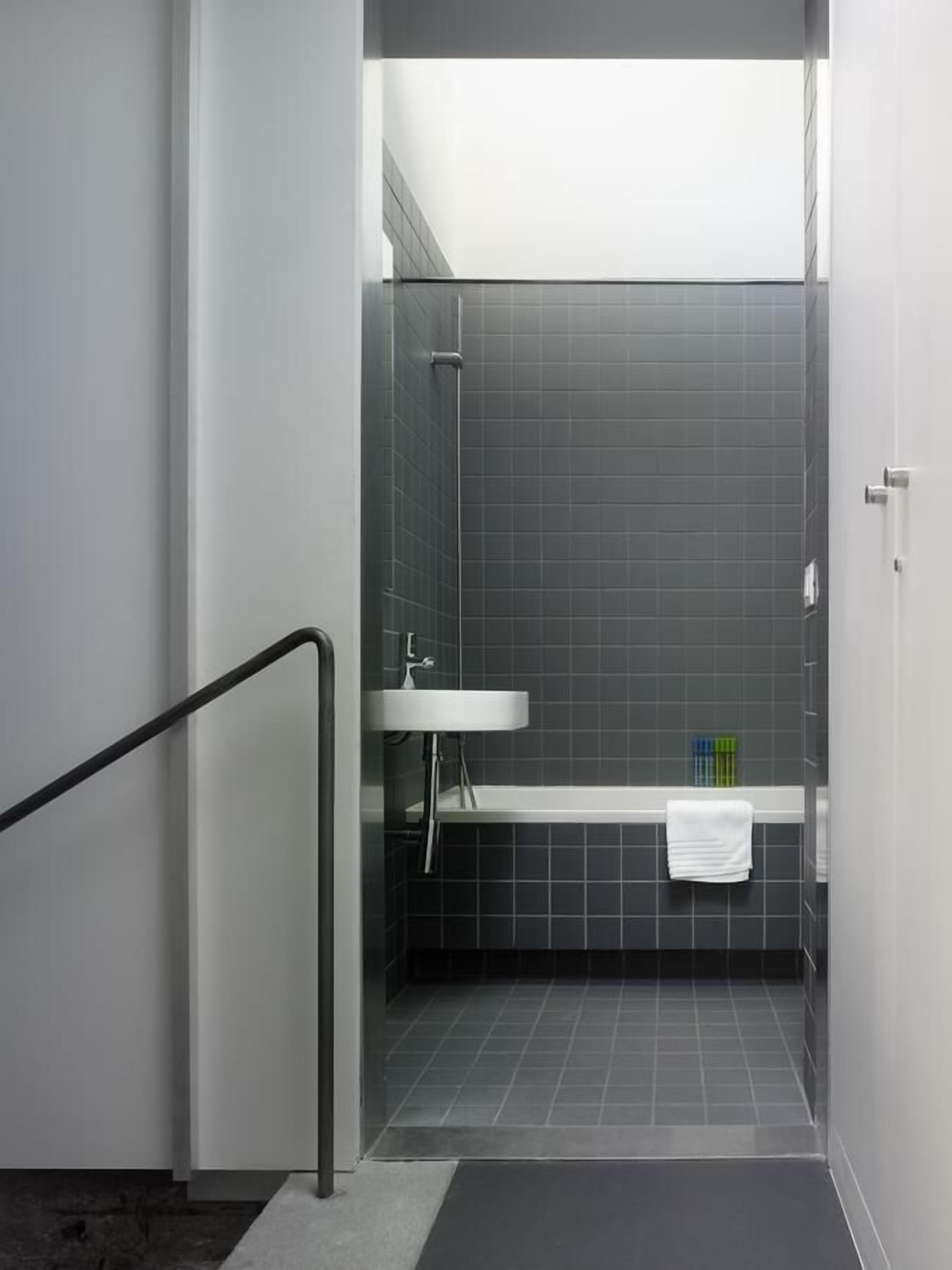 family quadruple room, multiple beds | bathroom | free toiletries, hair dryer, towels