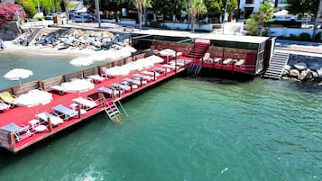 Private beach, white sand, free beach cabanas, sun-loungers